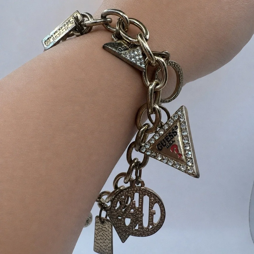 GUESS Vintage Gold Tone Charm Bracelet Rhinestone Logo Est 1981 Y2K Signed
